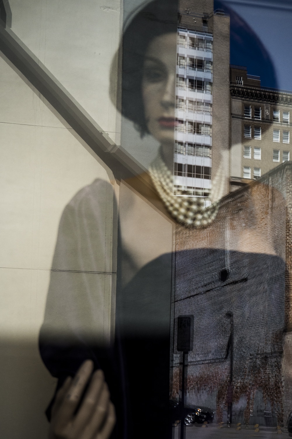 New Orleans elegant mannequin and reflected street
