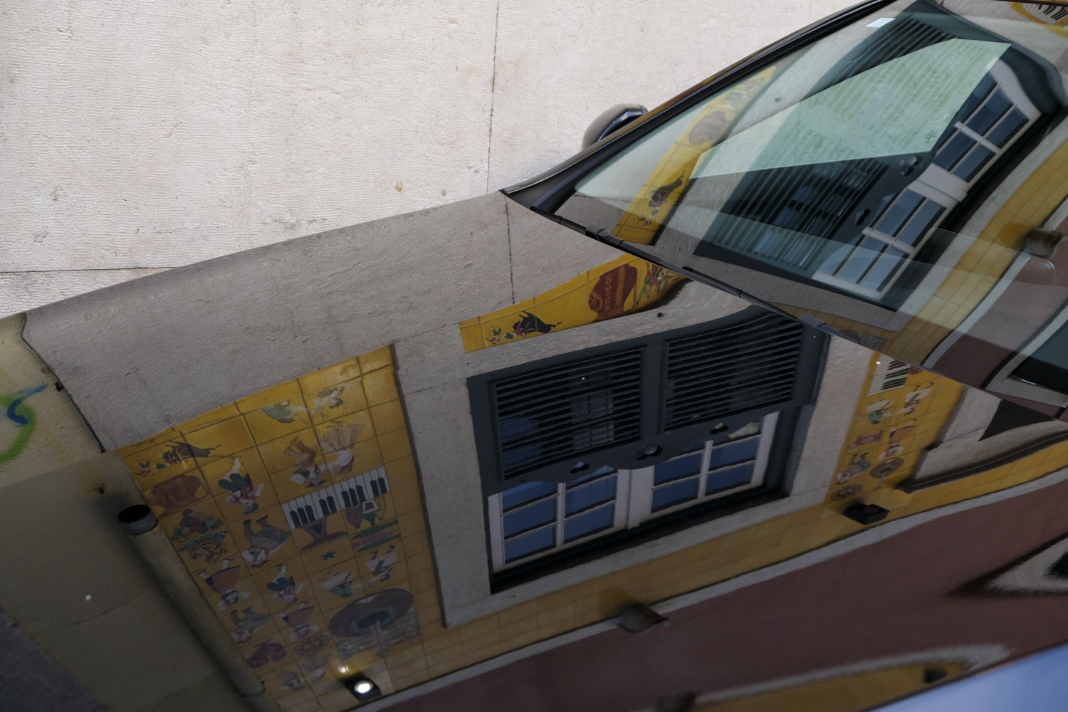 Colourful reflections on a car in Lisbon